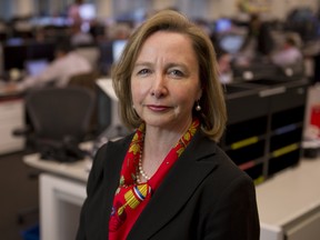 National Bank Financial's Susan Monteith poses on the company's trading floor in Toronto.