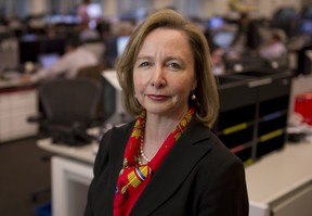 National Bank Financial's Susan Monteith poses on the company's trading floor in Toronto.