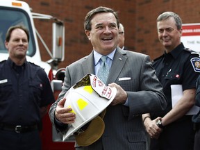 "With respect to tightening up the mortgage insurance market we’ve done it three times ... and we watch, we monitor the market and if we have to tighten it some more we will," Jim Flaherty told reporters while visiting a fire station in Stittsville, Ontario Thursday.