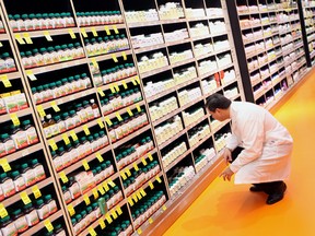 TORONTO, ONTARIO: NOVEMBER 30, 2011 -- LOBLAWS PHARMACY -- A pharmacist is pictured in the pharmacy section during the opening of Loblaws at Maple Leaf Gardens in Toronto Wednesday morning, November 30, 2011. (Darren Calabrese/National Post)[Post story by Joe O'Connor] //NATIONAL POST STAFF PHOTO