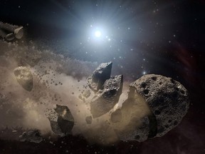 NASA image shows an artist's concept of a broken-up asteroid. Some are speculating that Planetary Resources Inc., a new startup to be revealed Tuesday, could have designs on mining asteroids for resources.