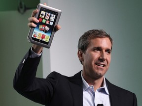 William Lynch, Chief Executive Officer of Barnes & Noble, holds up the Nook Tablet at the Union Square Barnes & Noble in New York in this November 7, 2011 file photo