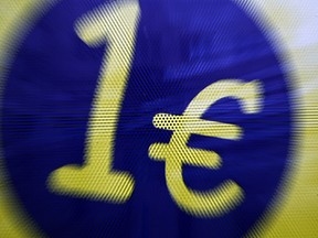 The euro was 1.5 percent lower this week, taking its decline this month to 5 percent