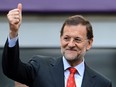 Spanish Prime Minister Mariano Rajoy gives the thumbs up during the UEFA EURO 2012 group C match between Spain and Italy at The Municipal Stadium on June 10, 2012 in Gdansk, Poland