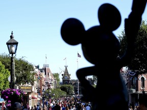 A statue of Mickey Mouse stands at Walt Disney Co.'s Disneyland amusement park in Anaheim, California.