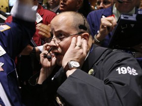 Macroeconomic issues such as the European debt crisis and America's fiscal cliff continued to weigh on markets Monday.