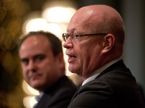 John Ruffolo, CEO of OMERS Venturesand and Bill Currie, vice chair of Deloitte Canada, speak in Toronto, Ontario, Canada, Thursday, December 13, 2012.