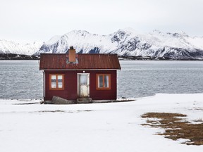 A house sits on the island of Lofoten, Norway. Norway, the world’s fifth-largest oil exporter, is boosting production of natural gas and opening more of its unexplored northern waters to drilling to counter a decline in oil output at maturing fields.