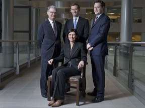 RBC Capital Markets was the clear leader in our 2012 League Table for financings. (Standing, from left) Peter Buzzi, Co-Head M & A; Doug Guzman, Head of Global Investment Banking; Patrick MacDonald, Managing Director, RBC Capital Markets and Co-Head, Debt Capital Markets, Canada. (Seated) Patti Shugart, Head of Corporate Banking, Deputy Head of Global Credit.