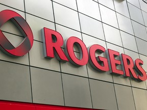 Rogers Communications Inc. signage is displayed at a retail store in Toronto, Ont. Rogers said it reached an agreement to deploy an LTE network in Manitoba and share the building and operating costs with MTS Inc.