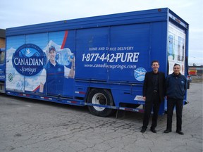 Aquaterra President and Chief Executive Officer, Tom Schmitt (left) and long-time delivery driver Jose Candela.