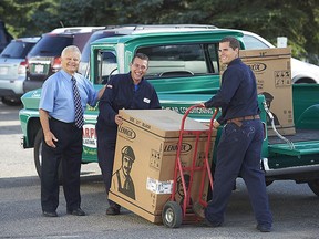 Arpi's Industries Ltd. founder Arpi Berdin, left, with service technicians Simon Stunell and Jami Fawcett