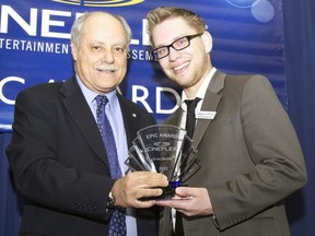 Ellis Jacob, CEO presents Cineplex’s highest honor, the EPIC award, to Evan Behiel at the 2012 General
Managers’ Conference.