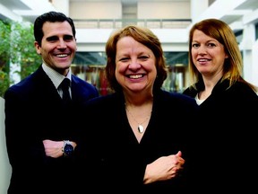 CMHC’s Mark Salerno, left, Gail Tolley  and Krissy MacDonald say the corporation’s staff are dedicated to their duty to promote housing quality, affordability  and choice for Canadians.