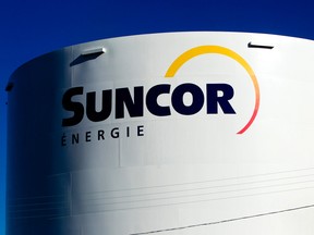 Suncor Energy Inc. signage is displayed on a petroleum storage tank.