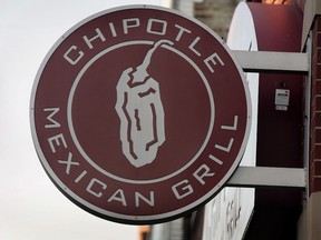 A Chipoltle Mexican Grill sign hangs in Chicago