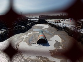An Enbridge Inc. oil pipeline sits under construction near Fort McMurray, Alberta.