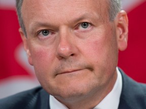 Bank of Canada Governor Stephen Poloz listens to a question following an interest rate announcement Wednesday July 17, 2013 in Ottawa.