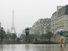 This picture taken in 2007 shows a replica of the Eiffel Tower standing in a residential and commercial real-estate development resembling a mini-Paris being built on the outskirts of Hangzhou, in eastern China's Zhejiang province.