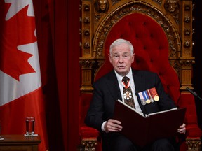 Governor General David Johnston delivers the Speech from the Throne in the Senate Chamber on Parliament Hill in Ottawa, Wednesday Oct. 16, 2013.