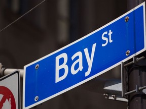 A sign for Bay Street is displayed in the financial district of Toronto.