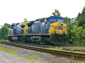 A CSX locomotive makes its way out of a railyard depot in Jacksonville, Florida