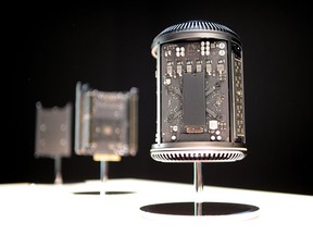 An Apple Mac Pro computer and its components are displayed during a launch event