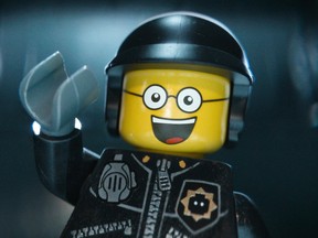 This image released by Warner Bros. Pictures shows the character Bad Cop/Good Cop, voiced by Liam Neeson, in a scene from "The Lego Movie." (AP Photo/Warner Bros. Pictures, file)