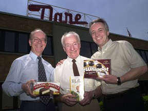 File photo of Carl Dare (centre), and his sons Bryan Dare and Graham Dare.