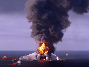 This U.S. Coast Guard handout image shows fire boat response crews as they battle the blazing remnants of the BP operated off shore oil rig, Deepwater Horizon, in the Gulf of Mexico on April 21, 2010.