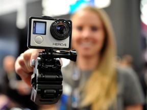 A GoPro Hero 4 camera is displayed at the 2015 International CES