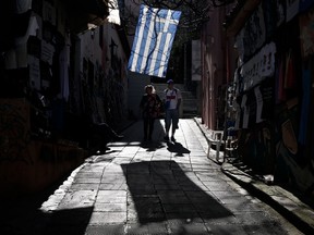 AP Photo/Petros Giannakouris