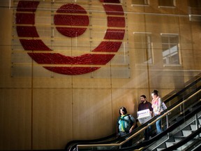 People leave Target's downtown Minneapolis corporate headquarters Tuesday, March 10, 2015.