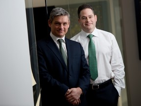 Stephen Andersons (left) and Brandon Osten (right), portfolio managers at Venator Capital Management, pose for a portrait at the companies office in Toronto, Ontario, February 4, 2014.