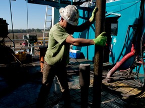 A Trinidad Drilling Ltd. floorhand works on rig in Fort Worth, Texas