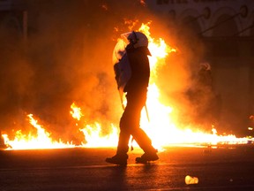 AP Photo/Petros Giannakouris