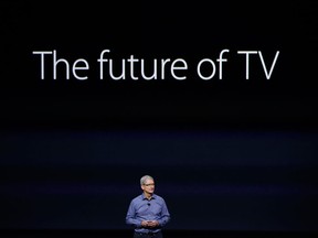 Apple CEO Tim Cook introduces a model of the Apple TV in September 2015