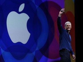 Apple CEO Tim Cook delivers the keynote address during Apple WWDC