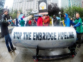 Demonstrators protest against  Enbridge Inc.'s Northern Gateway pipeline in Vancouver