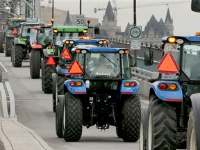 Dairy farmers heading to a TPP protest on Parliament Hill on Sept. 29, 2015.