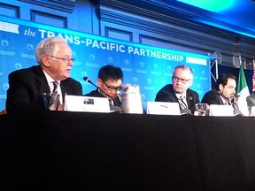 Delegates attending the Trans-Pacific Partnership talks hold a news conference in 2015