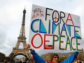 A rally near the Eiffel Tower in Paris on December 12, 2015 on the sidelines of the COP21, the UN conference on global warming.