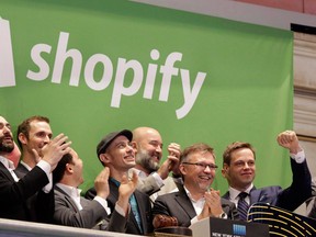 The Shopify team ring the New York Stock Exchange opening bell, marking the Canadian company's IPO on May 21, 2015.