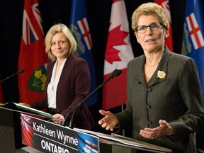 Kathleen Wynne praises Rachel Notley for the NDP government's climate change plan in a January joint news conference in Toronto
