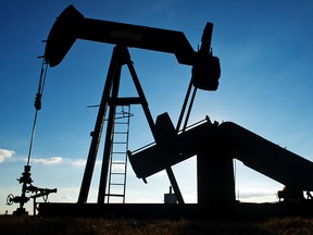 A pump jack operates in an oil field near Corpus Christi, Tex.