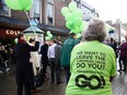A lady wears a "Grassroots Out" T-shirt in Wellingborough, 70 miles north of London, on January 23, 2016 to promote the launch of the "Grassroots Out", a new cross-party group that will campaign for the UK to leave the European Union.