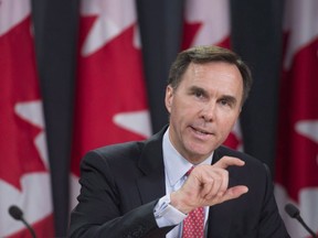 Federal Finance Minister Bill Morneau speaks during a news conference.