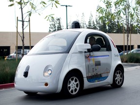 A self-driving car traversing a parking lot at Google's headquarters in Mountain View, California.