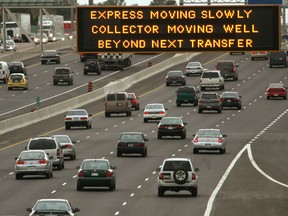 Traffic cars automobiles and congestion on Highway 401 in Toronto.