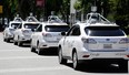 A row of Google self-driving Lexus cars in 2014.